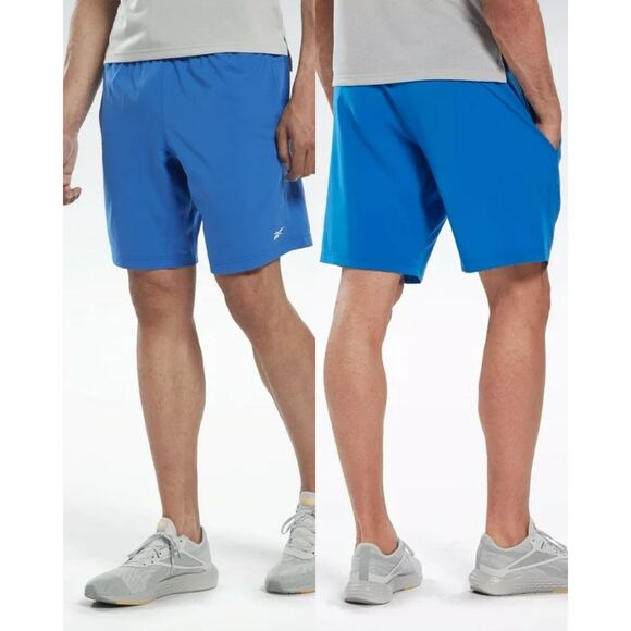 9. Reebok Woven NWT Moisture-Wicking 9" Drawstring Shorts Vector Blue - Picture 1 of 6